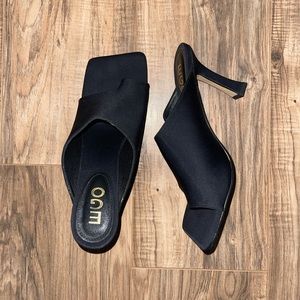Square toe neoprene heeled mules.